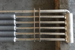 Produzione di scambiatori di calore Dettaglio Batteria-Scambiatore in tubo alettato per vapore inox/al-ita-srl